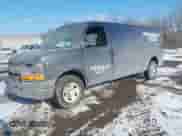2014 Chevrolet Express Cargo with VIN 1GCWGGBA5E1205786, listed as a IAAI auction lot 41339085 with 201,460 mi miles and . Bid and sale history available at DreamBid. Image 2.
