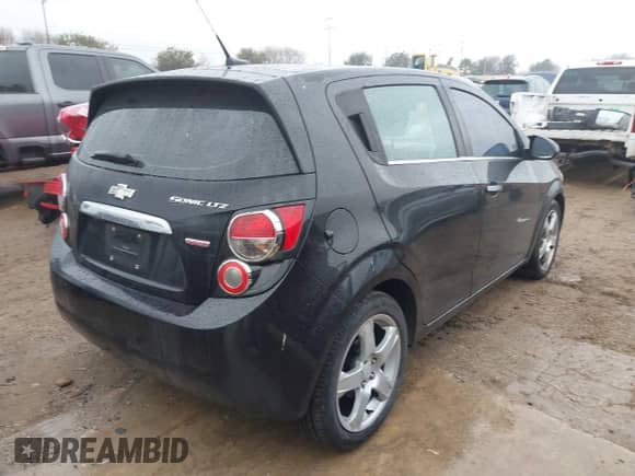2013 Chevrolet Sonic LTZ с VIN 1G1JE6SB2D4221744, выставлен на аукционе IAAI как лот 41422921 с пробегом 114 684 миль миль и . История ставок и продаж доступна на DreamBid. Изображение 4.