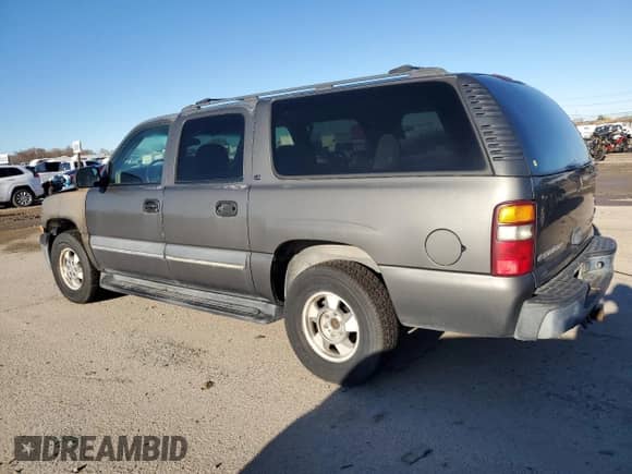 2002 Chevrolet Suburban LT with VIN 1GNEC16T22J141497, listed as a Copart auction lot 87526755 with 277,226 mi miles and Salvage title. Bid and sale history available at DreamBid. Image 2.