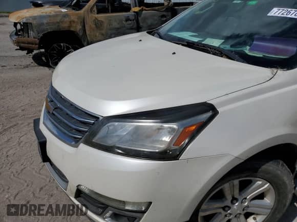 2014 Chevrolet Traverse LT с VIN 1GNKRHKD0EJ331733, выставлен на аукционе Copart как лот 77267894 с пробегом Не указан миль и Списание • Salvage title. История ставок и продаж доступна на DreamBid. Изображение 11.