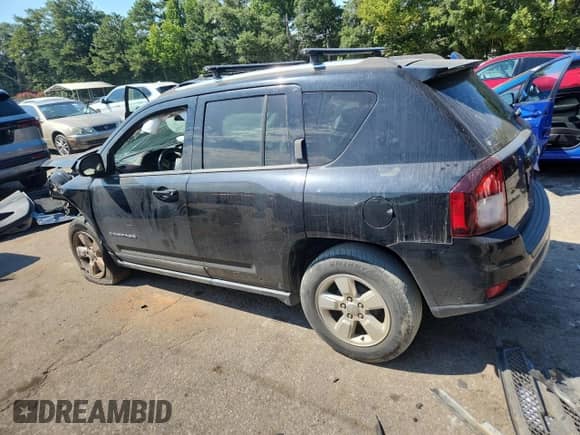 2014 Jeep Compass Sport with VIN 1C4NJCBA9ED573621, listed as a Copart auction lot 71227895 with Not provided miles and Salvage title. Bid and sale history available at DreamBid. Image 2.