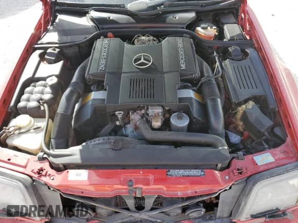 1991 Mercedes-Benz SL с VIN WDBFA66E8MF021631, выставлен на аукционе Copart как лот 77011794 с пробегом Не указан миль и Списание • Salvage title. История ставок и продаж доступна на DreamBid. Изображение 11.