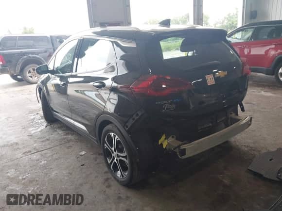 2017 Chevrolet Bolt EV Premier z VIN 1G1FX6S07H4177910, wystawiony jako IAAI lot #42800502 z przebiegiem 77 504 mil mil oraz . Historia ofert i sprzedaży dostępna na DreamBid. Obrazek 3.