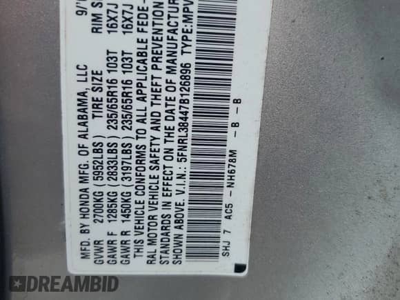 2007 Honda Odyssey EX z VIN 5FNRL38447B126896, wystawiony jako Copart lot #80313045 z przebiegiem 89 209 mil mil oraz Szkoda całkowita • Salvage title. Historia ofert i sprzedaży dostępna na DreamBid. Obrazek 13.