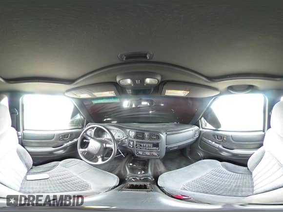 2001 Chevrolet Blazer LS z VIN 1GNCT18W91K167036, wystawiony jako Copart lot #47848415 z przebiegiem 145 278 mil mil oraz Szkoda całkowita • Salvage title. Historia ofert i sprzedaży dostępna na DreamBid. Obrazek 12.