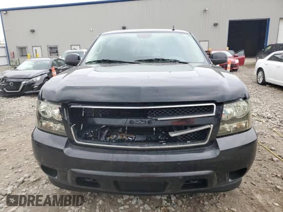 2011 Chevrolet Tahoe LS с VIN 1GNSKAE04BR277158, выставлен на аукционе Copart как лот 60241045 с пробегом 272 165 миль миль и На запчасти • Non repairable. История ставок и продаж доступна на DreamBid. Изображение 5.