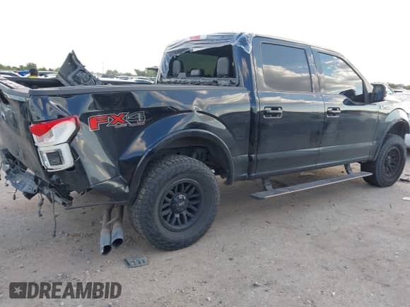 2018 Ford F-150 XL z VIN 1FTEW1E53JFB89708, wystawiony jako IAAI lot #43303196 z przebiegiem 168 714 mil mil oraz . Historia ofert i sprzedaży dostępna na DreamBid. Obrazek 13.