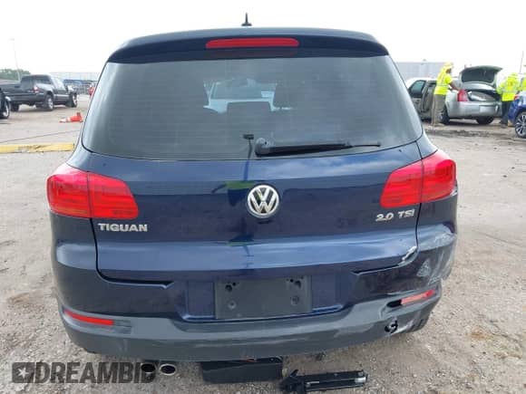 2013 Volkswagen Tiguan SE z VIN WVGAV3AX9DW613283, wystawiony jako IAAI lot #41954359 z przebiegiem 147 525 mil mil oraz . Historia ofert i sprzedaży dostępna na DreamBid. Obrazek 16.