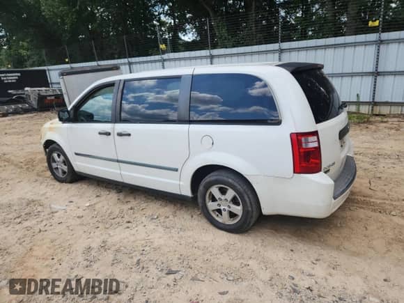 2010 Dodge Grand Caravan Cargo with VIN 2D4CN1AE3AR244377, listed as a Copart auction lot 65817385 with Not provided miles and Salvage title. Bid and sale history available at DreamBid. Image 2.