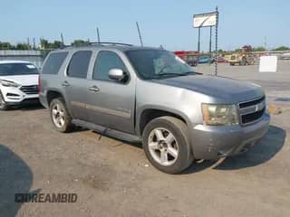 2007 Chevrolet Tahoe LT with VIN 1GNFC13067R410558, listed as a IAAI auction lot 42934430 with 313,927 mi miles and . Bid and sale history available at DreamBid. Image 1.
