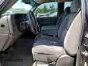 2005 GMC Sierra 1500 SLT z VIN 1GTEK19B45E174285, wystawiony jako Copart lot #59007805 z przebiegiem 166 041 mil mil oraz Szkoda całkowita • Salvage title. Historia ofert i sprzedaży dostępna na DreamBid. Obrazek 7.