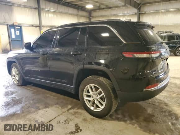 2023 Jeep Grand Cherokee Altitude with VIN 1C4RJHAGXPC646895, listed as a Copart auction lot 69633245 with 13,059 mi miles and Salvage title. Bid and sale history available at DreamBid. Image 2.