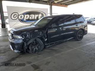 2015 Dodge Durango R/T with VIN 1C4SDHCT7FC888397, listed as a Copart auction lot 57274145 with 153,167 mi miles and Salvage title. Bid and sale history available at DreamBid. Image 1.
