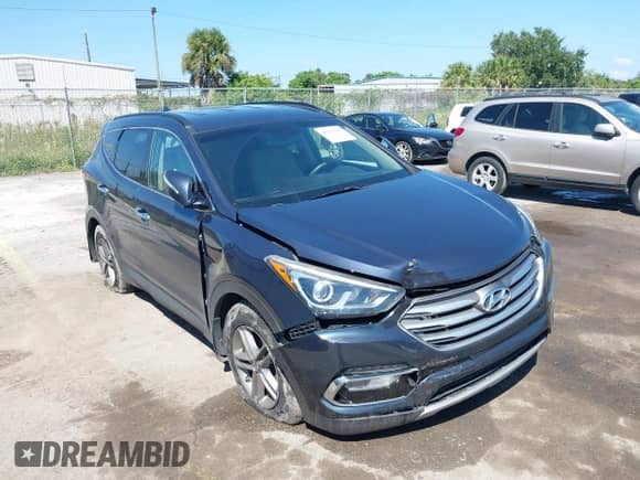 2018 Hyundai Santa Fe 2.4L with VIN 5XYZUDLB4JG528684, listed as a IAAI auction lot 43270994 with 85,756 mi miles and . Bid and sale history available at DreamBid. Image 6.