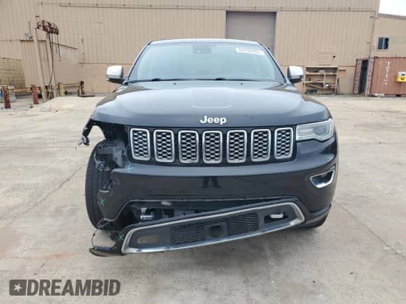 2017 Jeep Grand Cherokee Overland with VIN 1C4RJFCG8HC940430, listed as a Copart auction lot 68780995 with 150,371 mi miles and Salvage title. Bid and sale history available at DreamBid. Image 5.