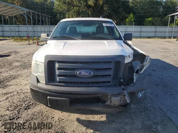 2010 Ford F-150 XL with VIN 1FTMF1CW6AKA46427, listed as a Copart auction lot 69016095 with 201,391 mi miles and Salvage title. Bid and sale history available at DreamBid. Image 5.