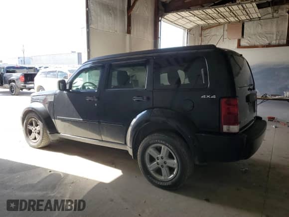 2009 Dodge Nitro SE with VIN 1D8GU28K89W545430, listed as a Copart auction lot 50225085 with 143,938 mi miles and Salvage title. Bid and sale history available at DreamBid. Image 2.