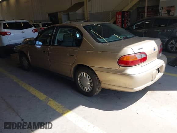 2004 Chevrolet Malibu Classic z VIN 1G1ND52F74M674064, wystawiony jako IAAI lot #42473384 z przebiegiem 127 001 mil mil oraz . Historia ofert i sprzedaży dostępna na DreamBid. Obrazek 3.