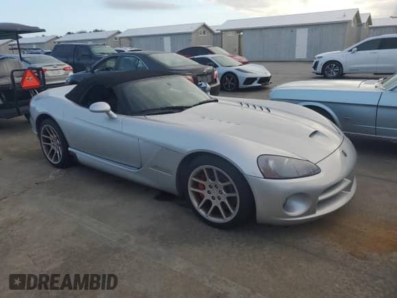 2004 Dodge Viper SRT-10 with VIN 1B3JZ65Z94V100094, listed as a Copart auction lot 74979634 with Not provided miles and Non repairable. Bid and sale history available at DreamBid. Image 4.