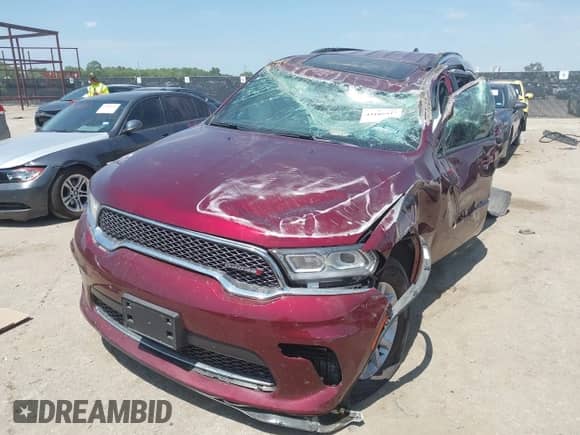 2024 Dodge Durango SXT with VIN 1C4RDHAG1RC257993, listed as a IAAI auction lot 43105947 with Not provided miles and . Bid and sale history available at DreamBid. Image 2.