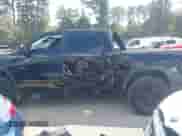 2019 Ram 1500 Rebel z VIN 1C6SRFLT9KN603873, wystawiony jako IAAI lot #43149890 z przebiegiem 144 554 mil mil oraz . Historia ofert i sprzedaży dostępna na DreamBid. Obrazek 14.