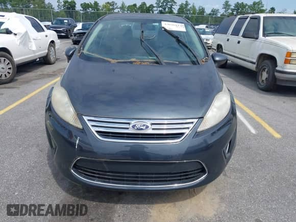 2011 Ford Fiesta SE z VIN 3FADP4BJ9BM115583, wystawiony jako IAAI lot #43026815 z przebiegiem 177 592 mil mil oraz . Historia ofert i sprzedaży dostępna na DreamBid. Obrazek 6.