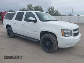 2013 Chevrolet Suburban LT with VIN 1GNSKJE72DR126867, listed as a IAAI auction lot 43030718 with 204,419 mi miles and . Bid and sale history available at DreamBid. Image 1.