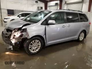 2012 Toyota Sienna XLE AAS with VIN 5TDYK3DC2CS262722, listed as a Copart auction lot 65926835 with 209,367 mi miles and Salvage title. Bid and sale history available at DreamBid. Image 1.