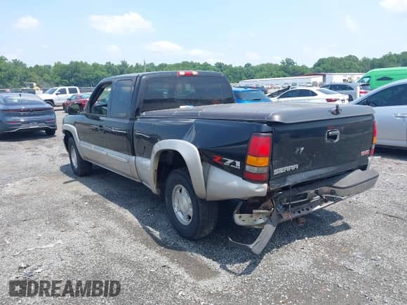 2004 GMC Sierra 1500 SLE with VIN 2GTEK19T741131522, listed as a IAAI auction lot 42795630 with 238,349 mi miles and . Bid and sale history available at DreamBid. Image 3.