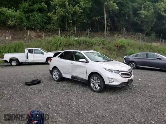 2020 Chevrolet Equinox Premier с VIN 3GNAXYEX9LS665844, выставлен на аукционе Copart как лот 68512015 с пробегом 16 080 миль миль и Списание • Salvage title. История ставок и продаж доступна на DreamBid. Изображение 14.