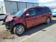 2014 Toyota Sienna XLE with VIN 5TDYK3DC7ES472641, listed as a Copart auction lot 84237025 with 164,686 mi miles and Salvage title. Bid and sale history available at DreamBid. Image 1.