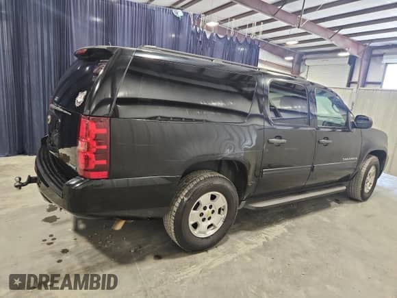 2010 Chevrolet Suburban LS с VIN 1GNUCHE0XAR161346, выставлен на аукционе Copart как лот 81223895 с пробегом 211 599 миль миль и Чистый • Clean title. История ставок и продаж доступна на DreamBid. Изображение 3.