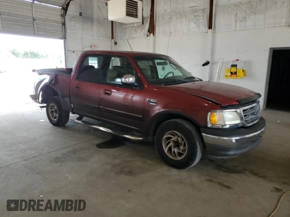 2002 Ford F-150 XLT с VIN 1FTRW07L42KC42383, выставлен на аукционе Copart как лот 67435455 с пробегом 237 921 миль миль и Списание • Salvage title. История ставок и продаж доступна на DreamBid. Изображение 4.