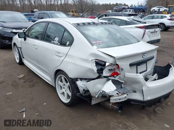 2018 Subaru WRX Premium with VIN JF1VA1C62J9814453, listed as a IAAI auction lot 41679314 with 85,936 mi miles and . Bid and sale history available at DreamBid. Image 3.