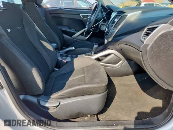 2014 Hyundai Veloster с VIN KMHTC6AD8EU189825, выставлен на аукционе Copart как лот 80929225 с пробегом 115 819 миль миль и Списание • Salvage title. История ставок и продаж доступна на DreamBid. Изображение 7.