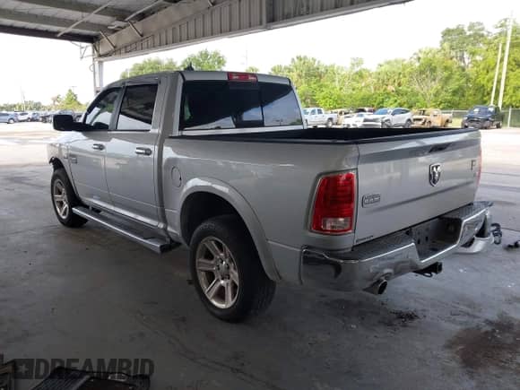 2015 Ram 1500 Laramie Limited with VIN 1C6RR7PT1FS788507, listed as a IAAI auction lot 42400146 with 129,572 mi miles and . Bid and sale history available at DreamBid. Image 3.