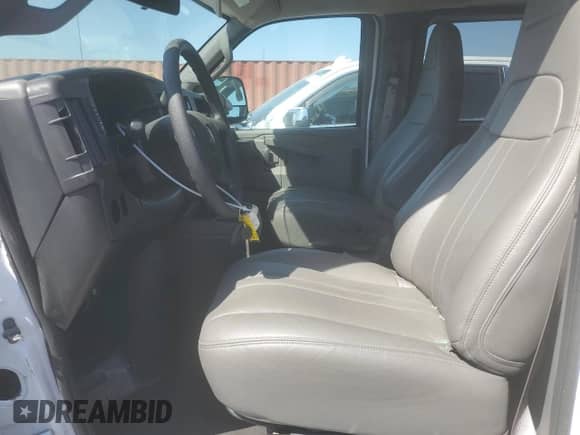 2020 Chevrolet Express Passenger LS with VIN 1GAZGNFG7L1273707, listed as a Copart auction lot 48777625 with 14,825 mi miles and Salvage title. Bid and sale history available at DreamBid. Image 7.