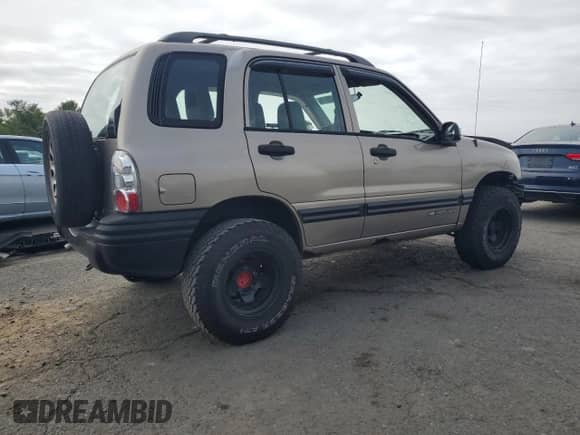 2002 Chevrolet Tracker с VIN 2CNBJ13C526947171, выставлен на аукционе Copart как лот 81423375 с пробегом 127 330 миль миль и Списание • Salvage title. История ставок и продаж доступна на DreamBid. Изображение 3.