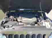 2015 Jeep Wrangler Rubicon Hard Rock z VIN 1C4BJWCGXFL771669, wystawiony jako IAAI lot #42057423 z przebiegiem 36 996 mil mil oraz . Historia ofert i sprzedaży dostępna na DreamBid. Obrazek 10.