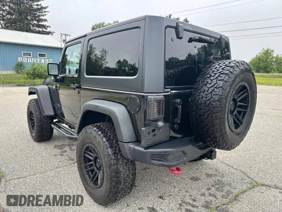 2015 Jeep Wrangler Rubicon Hard Rock z VIN 1C4BJWCG4FL524440, wystawiony jako Copart lot #63147975 z przebiegiem 142 024 mil mil oraz Czysty tytuł • Clean title. Historia ofert i sprzedaży dostępna na DreamBid. Obrazek 3.
