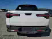 2022 Hyundai Santa Cruz Limited with VIN 5NTJEDAF6NH024833, listed as a Copart auction lot 77374634 with 26,684 mi miles and Salvage title. Bid and sale history available at DreamBid. Image 6.