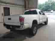 2018 Toyota Tacoma SR5 with VIN 5TFRZ5CN2JX058282, listed as a IAAI auction lot 42633438 with 94,071 mi miles and . Bid and sale history available at DreamBid. Image 4.