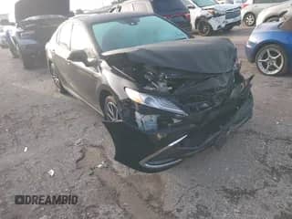 2021 Toyota Camry Hybrid XLE with VIN 4T1F31AK6MU547694, listed as a IAAI auction lot 42618333 with 18,489 mi miles and . Bid and sale history available at DreamBid. Image 1.