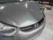 2013 Hyundai Elantra GLS z VIN 5NPDH4AE3DH240602, wystawiony jako IAAI lot #42725541 z przebiegiem 103 774 mil mil oraz . Historia ofert i sprzedaży dostępna na DreamBid. Obrazek 13.