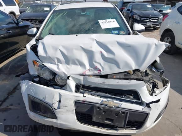2014 Chevrolet Sonic LT with VIN 1G1JC5SH9E4203540, listed as a IAAI auction lot 43212816 with 99,703 mi miles and . Bid and sale history available at DreamBid. Image 13.