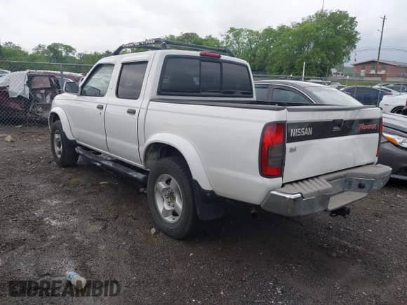 2000 Nissan Frontier XE with VIN 1N6ED27Y2YC355776, listed as a IAAI auction lot 42107613 with 235,461 mi miles and . Bid and sale history available at DreamBid. Image 3.