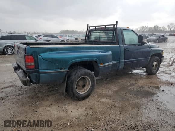 1997 Dodge RAM with VIN 1B7MC36D3VJ528458, listed as a Copart auction lot 86628954 with 261,318 mi miles and Salvage title. Bid and sale history available at DreamBid. Image 3.