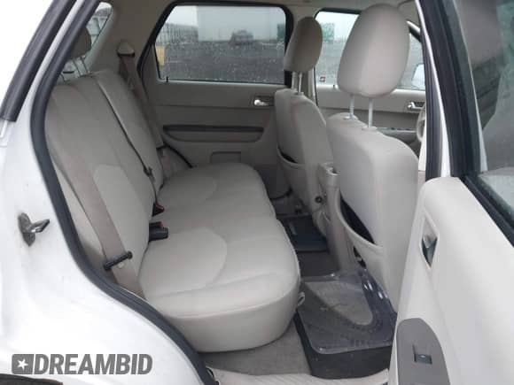 2008 Mercury Mariner with VIN 4M2CU91Z88KJ01185, listed as a IAAI auction lot 41778434 with 165,654 mi miles and . Bid and sale history available at DreamBid. Image 8.