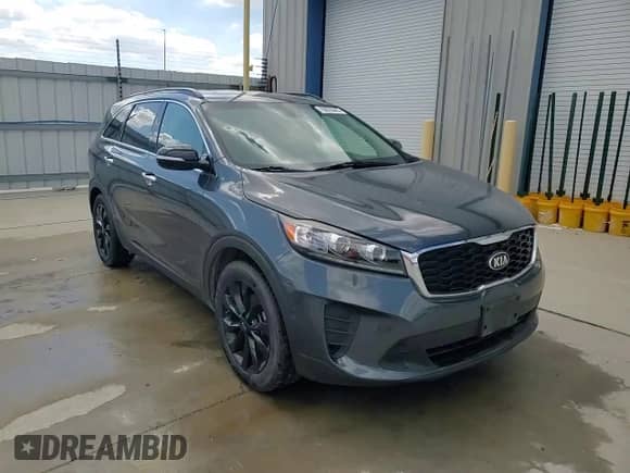 2019 Kia Sorento LX с VIN 5XYPG4A51KG603273, выставлен на аукционе Copart как лот 70023045 с пробегом 99 903 миль миль и На запчасти • Non repairable. История ставок и продаж доступна на DreamBid. Изображение 14.