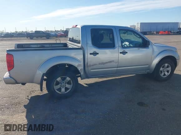 2011 Nissan Frontier Pro-4X z VIN 1N6AD0EV3BC434991, wystawiony jako IAAI lot #42086934 z przebiegiem 189 908 mil mil oraz . Historia ofert i sprzedaży dostępna na DreamBid. Obrazek 13.